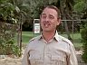 Higgins (John Hillerman)