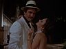 Magnum (Tom Selleck) & Louise Jackson (Judith Chapman)