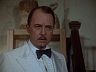 Higgins (John Hillerman)