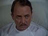 Higgins (John Hillerman)