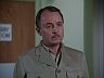 Higgins (John Hillerman)