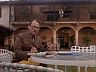 Higgins (John Hillerman)