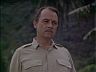 Higgins (John Hillerman)