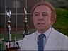 Ronald Mills (Henry Gibson)