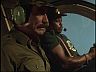 Magnum (Tom Selleck) & T.C. (Roger E. Mosley)