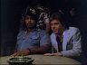 T.C. (Roger E. Mosley) & Rick (Larry Manetti)