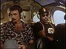Magnum (Tom Selleck) & T.C. (Roger E. Mosley)