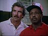 Magnum (Tom Selleck) & T.C. (Roger E. Mosley)