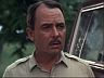 Higgins (John Hillerman)