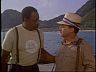 T.C. (Roger E. Mosley) & Higgins (John Hillerman)