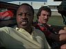 T.C. (Roger E. Mosley) & Magnum (Tom Selleck)