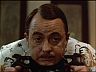 Higgins (John Hillerman)