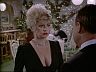 Joy Kelly (Joy Garrett) & Higgins (John Hillerman)