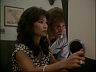 Hall of Records Clerk (Lani Kim) & Rick (Larry Manetti)