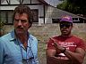 Magnum (Tom Selleck) & T.C. (Roger E. Mosley)