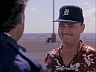 Higgins (John Hillerman)