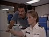 Magnum (Tom Selleck) & Lt. Cmdr. Maggie Poole (Jean Bruce Scott)