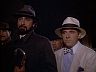 Malcolm (Kabir Bedi) & Peter Riddley-Smythe (Anthony Newley)