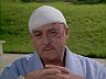 Higgins (John Hillerman)